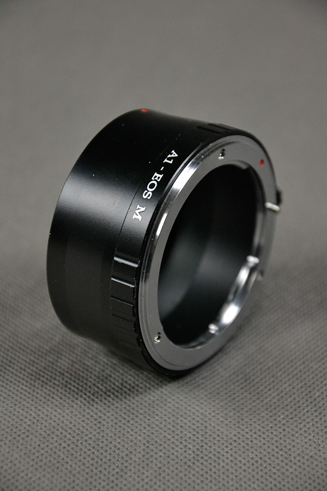 Nikon AI-EOS(M) pro Canon EOS(M) a objektiv Nikon  